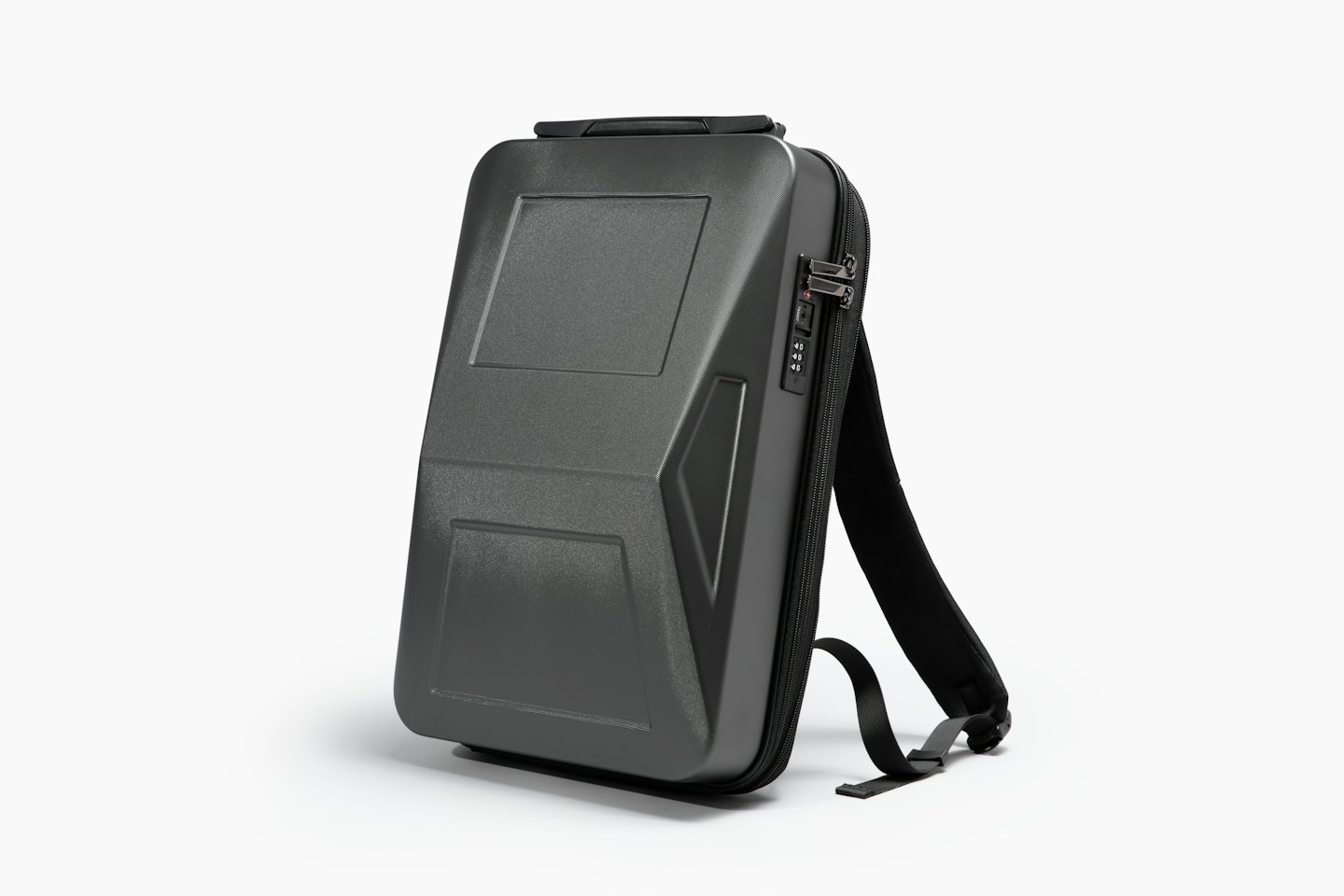 A hard-shell backpack with a combination lock stands upright.